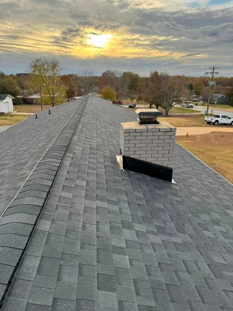 Shingle Replacement Conroe TX 2 Completed asphalt shingle roof replacement on a home in Conroe, TX