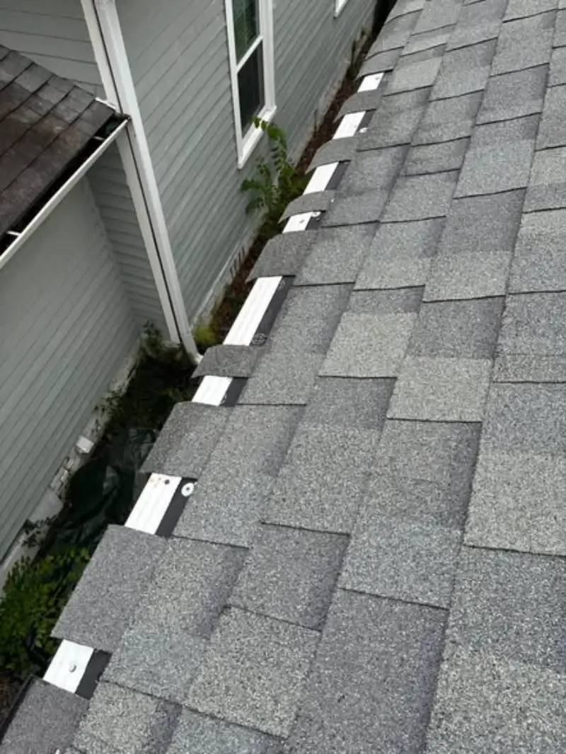 Shingle replacement work on a home in Conroe, TX